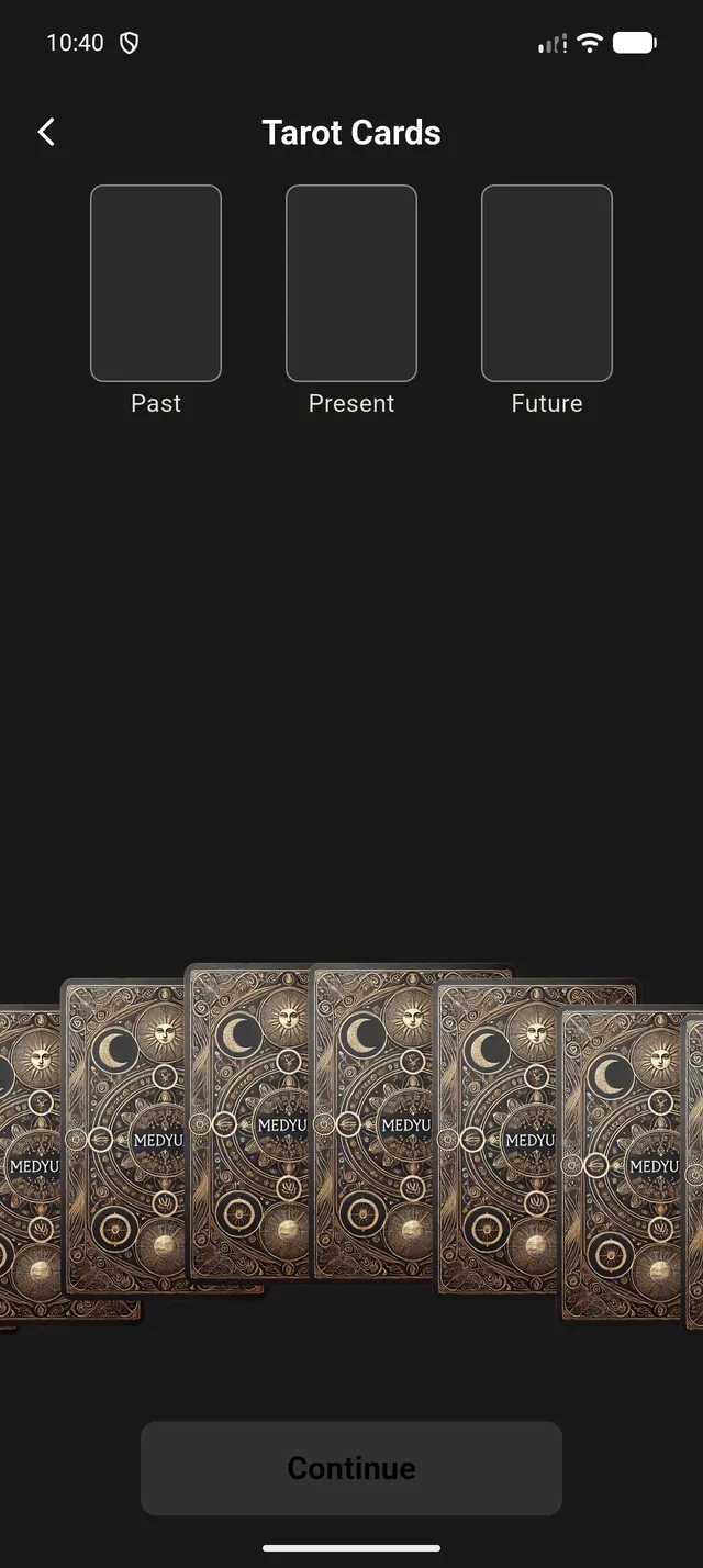 Tarot spread screen with past, present and future card slots